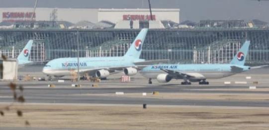 大韩航空一客机起飞前发现实弹 现场曝光218名乘客紧急疏散